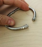 Armreif MK silberfarben mit Magnetverschluss