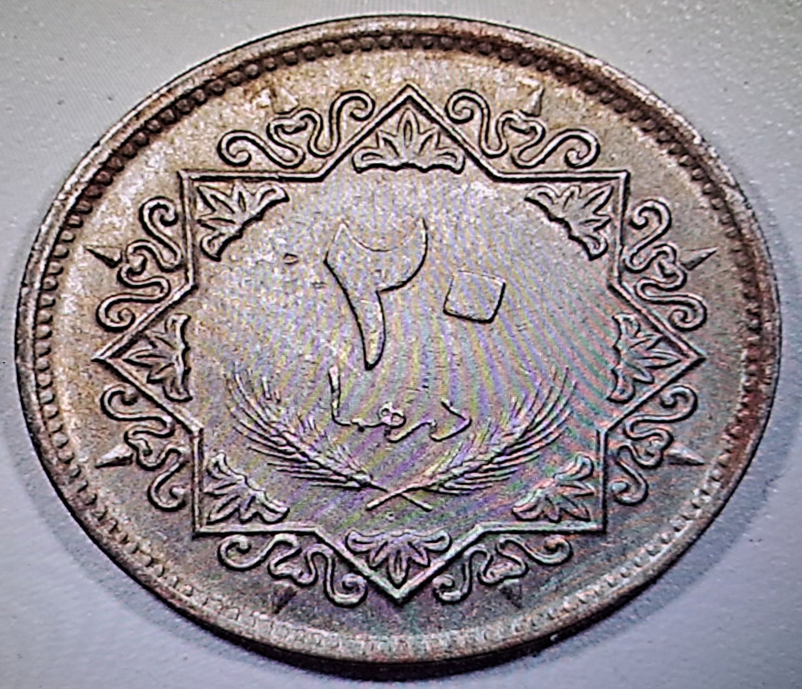 Tutti le monete: Libyen  1 Piaster, 1952 + Libyen  10 Dirhem, 1975 – Usato da Tenniken venduto da mik_6mxg 6