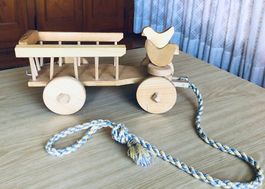 Pastorini-Holzwagen zum Nachziehen mit drehenden Vögeln