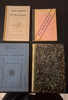 4 alte Schulbücher zwischen 1877 und 1913