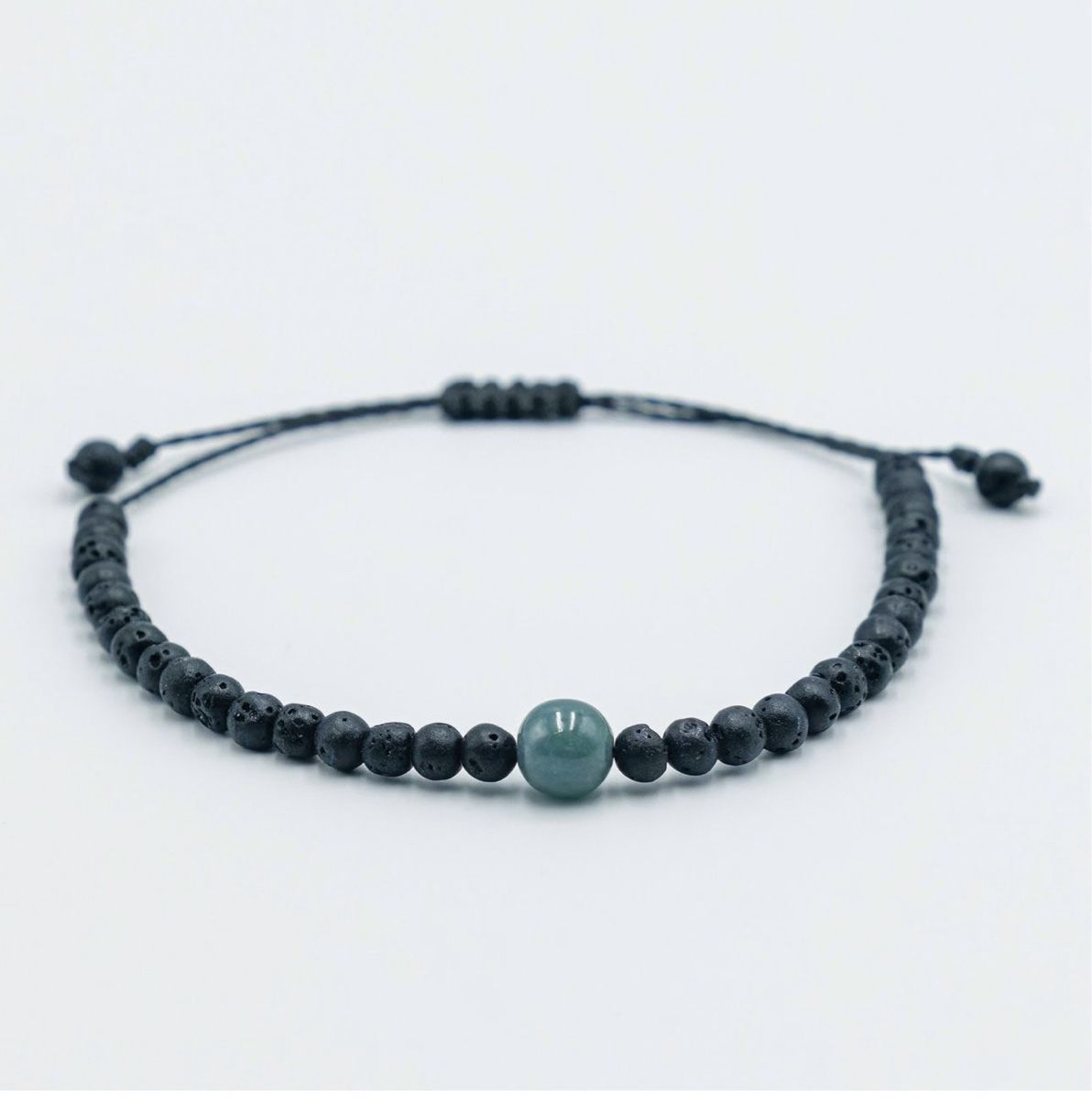 Bracciali & Braccialetti: Armband mit Jade und Lavastein – Nuovo e nell'imballaggio originale da Ruggell venduto da JadeShop