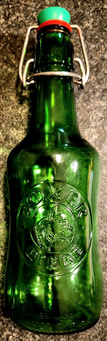 Bicchieri, Caraffe & Bottiglie: Ancienne bouteille bière Boxer – Usato da Montet (Glâne) venduto da Koada2