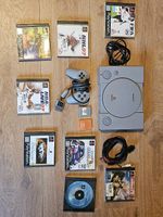 PS1 con diversi giochi
