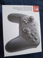 Nintendo Switch Pro Controller schwarz neuwertig