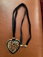 1 collier fantaisie selon photo