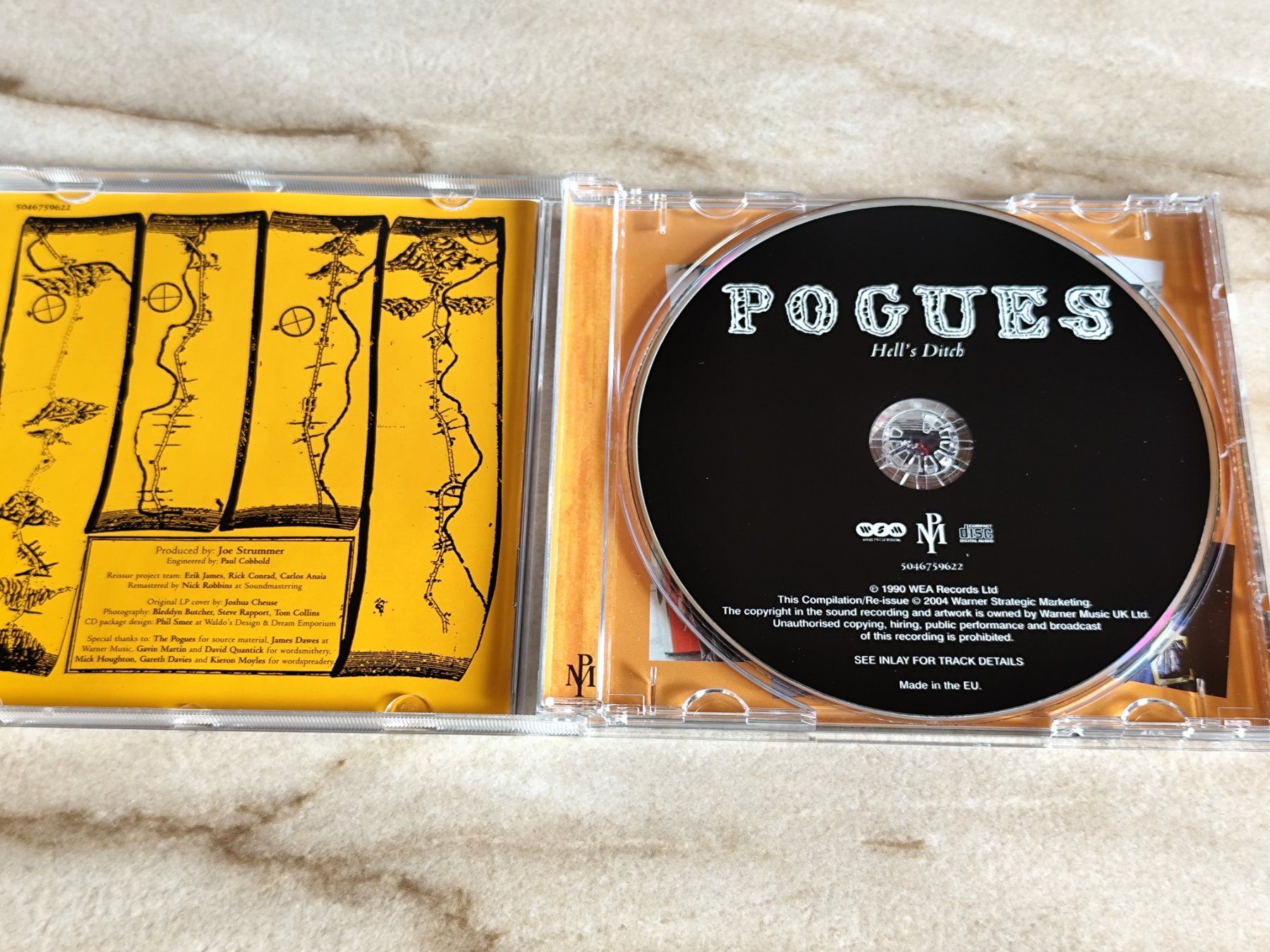 CD: POGUES - HELL'S DITCH - WEA Records Ltd. - Compilation 2004 – Usato da Ermenswil venduto da easyric 1