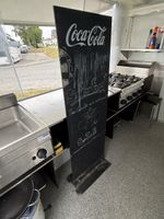 Werbetafel Coca Cola