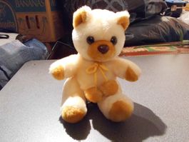 Teddy Bär  beige/braun, Masche mit Pomme