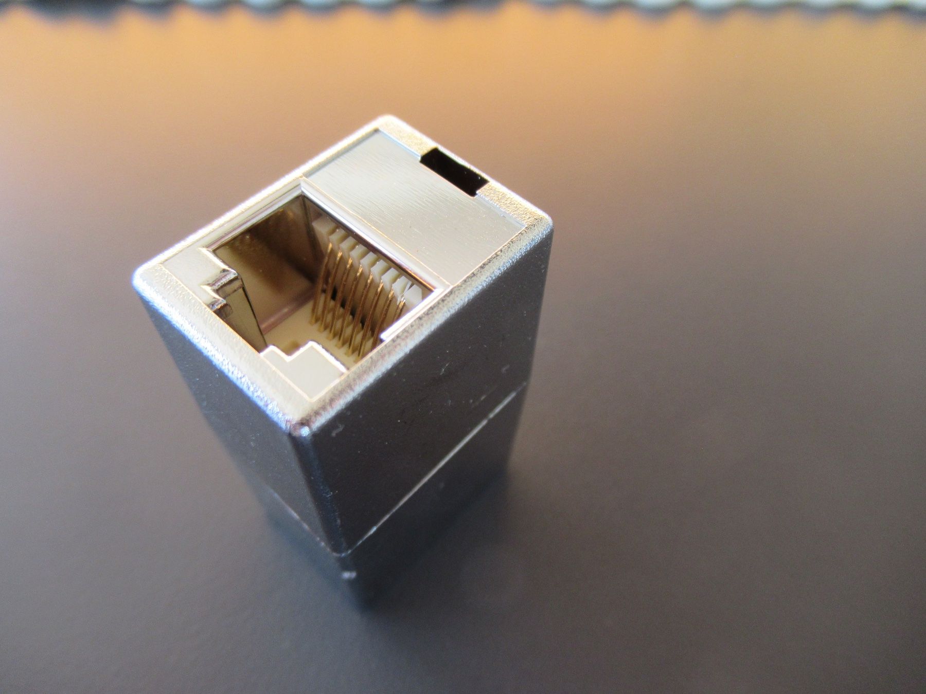 Laufwerke & Adapter: RJ45 Modularkupplung, Gender Changer – Neu und originalverpackt aus Obergösgen von cairn
