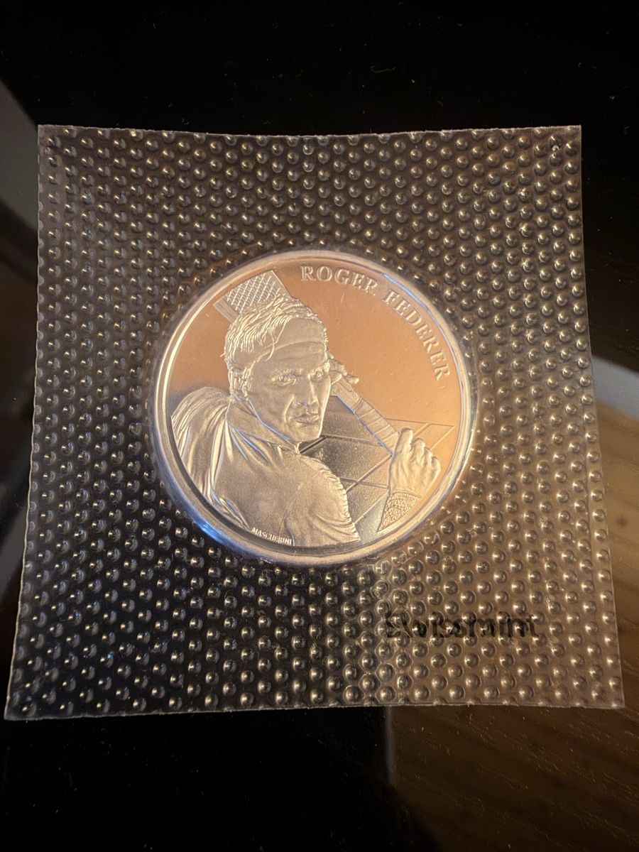 Tutti le monete: Roger Federer Gedenkmünze - 2020 – Nuovo e nell'imballaggio originale da Reichenburg venduto da DELLON