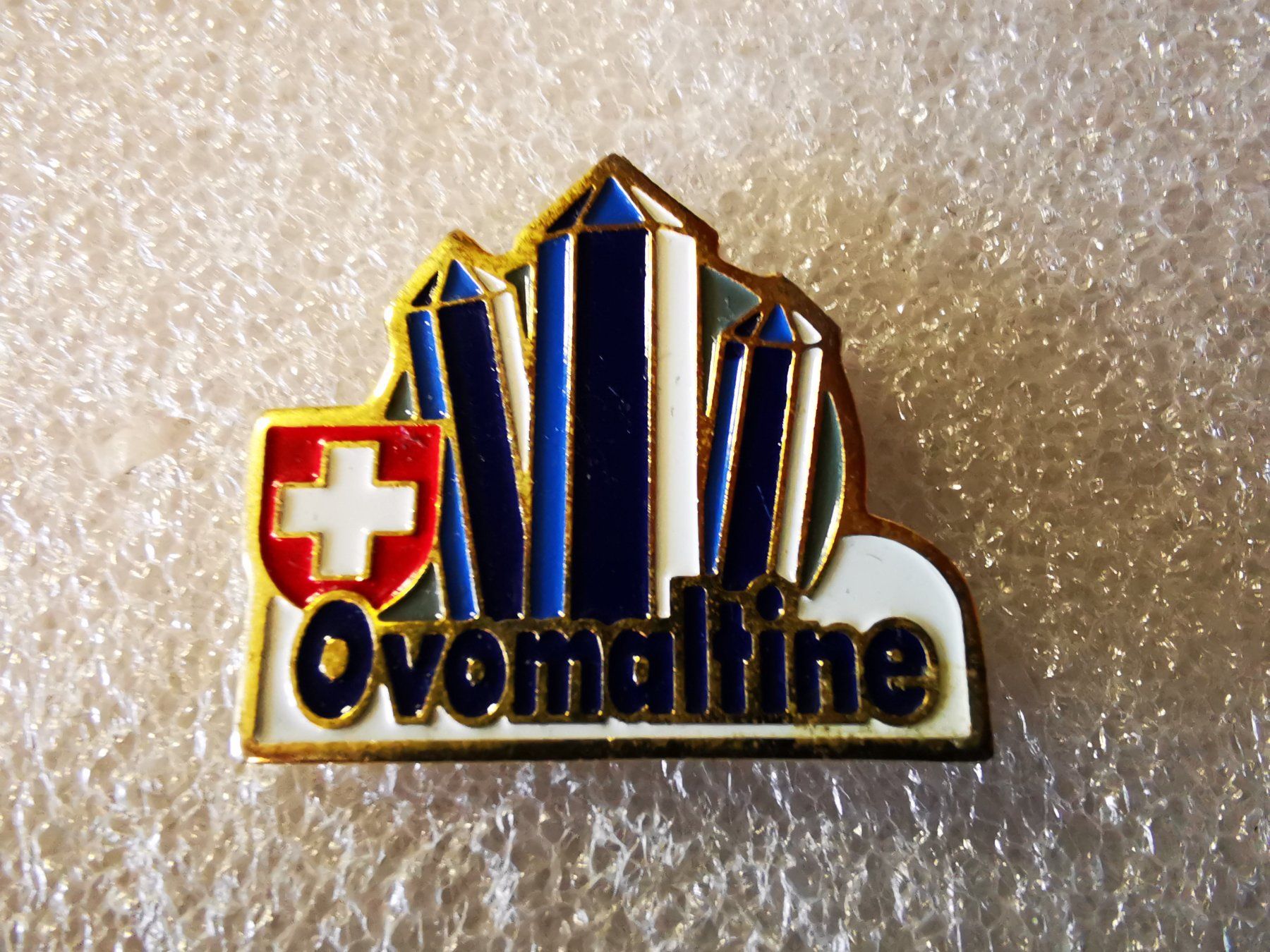 Plaketten & Abzeichen: Ansteckpin 2: Ovomaltine – Gebraucht aus Oppligen von Pin-Fall-Shop