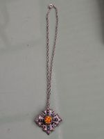 Halskette mit Kreuz-Anhänger orange Stein gebraucht