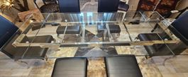 Table en verre et chrome avec allonges intégrées