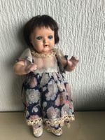 Poupée ancienne yeux bleus robe à fleurs occasion K&R