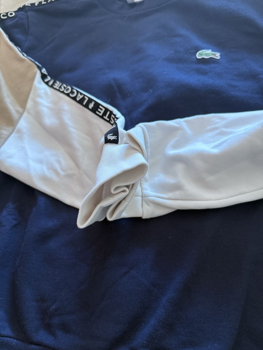 Lacoste Maglioni & Felpe: Pull Lacoste bleu marine logo bandes  – Usato da Monthey venduto da Joseph-29 4