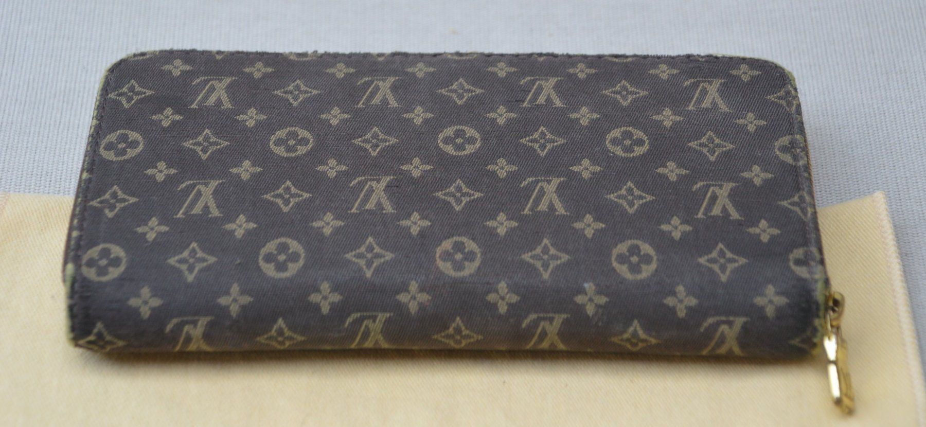 Louis Vuitton Portamonete: Louis Vuitton Ebene Monogram Mini Lin Zippy Wallet – Usato da Collonges venduto da arashee 6