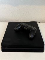 Sony PlayStation 4 Slim Konsole mit Controller und Spielen