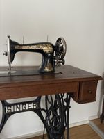 Singer sewing machine with wooden table acceptable