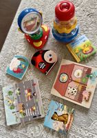Kinderspielzeug Set Holzpuzzles und Bücher gebraucht