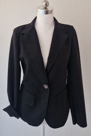 VESTE