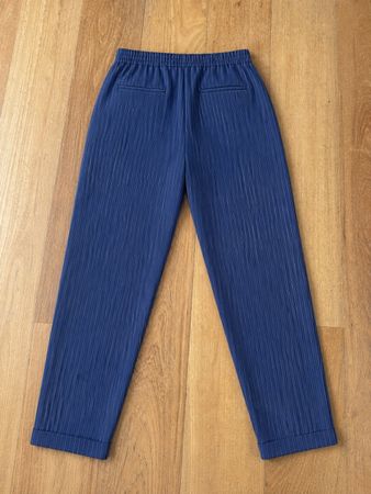 Pantaloni neri a righe