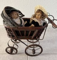 Antiker Puppewagen mit 2 Puppen