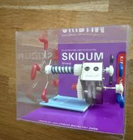 Kikkerland Skidum Windup Spielzeug Kinderspielzeug