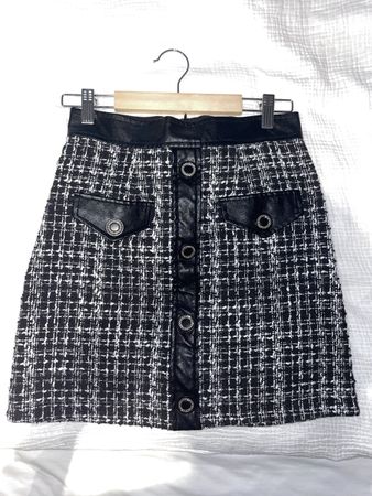 Minirock Lederimitat schwarz/weiss Grösse XS