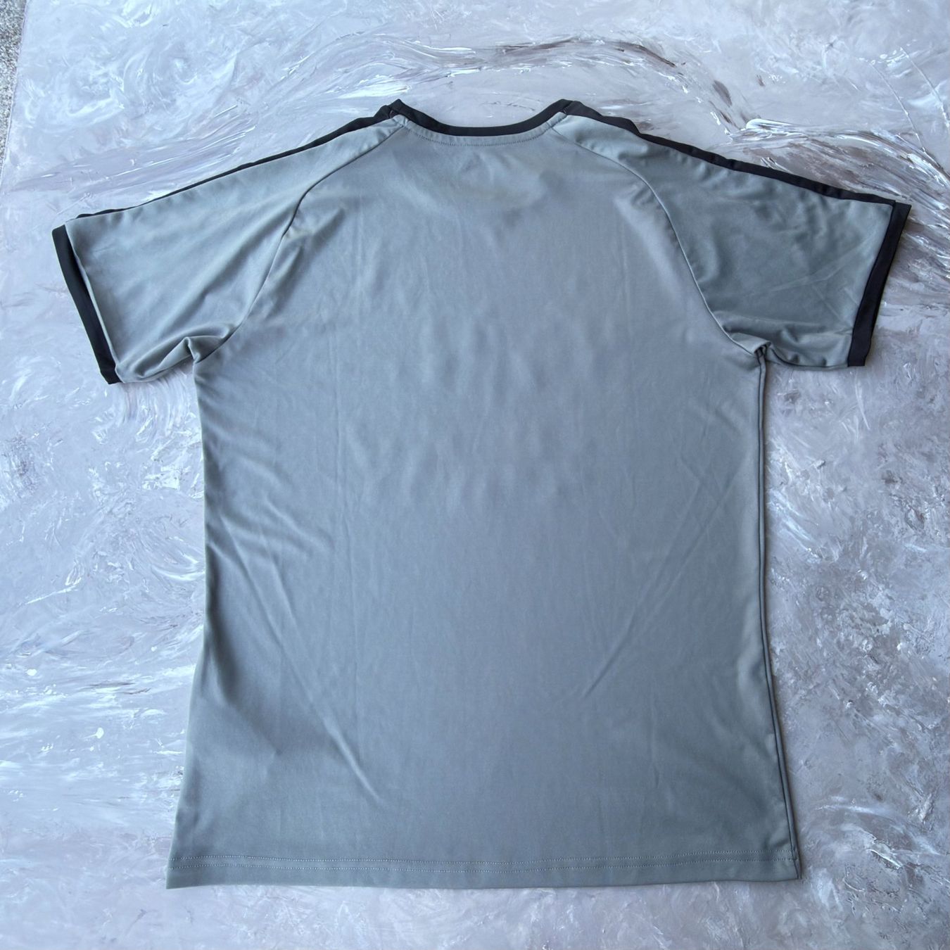 Puma T-shirt: T-shirt Puma ACGF Fair Play gris – Usato da Thônex venduto da Suisse.Shopping 1