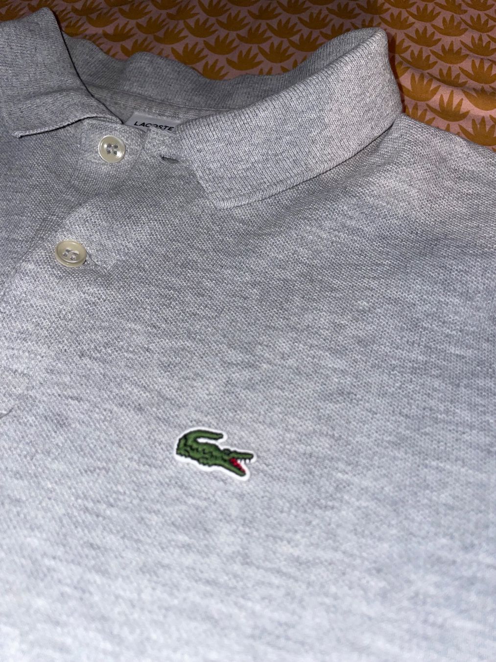 Lacoste Polo-Shirts: Polo Lacoste gris – Neu (gemäss Beschreibung) aus Mollens VS von tao_nh7g 1