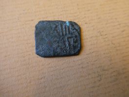 uralte orientalische Bronzemünze      1.21 g