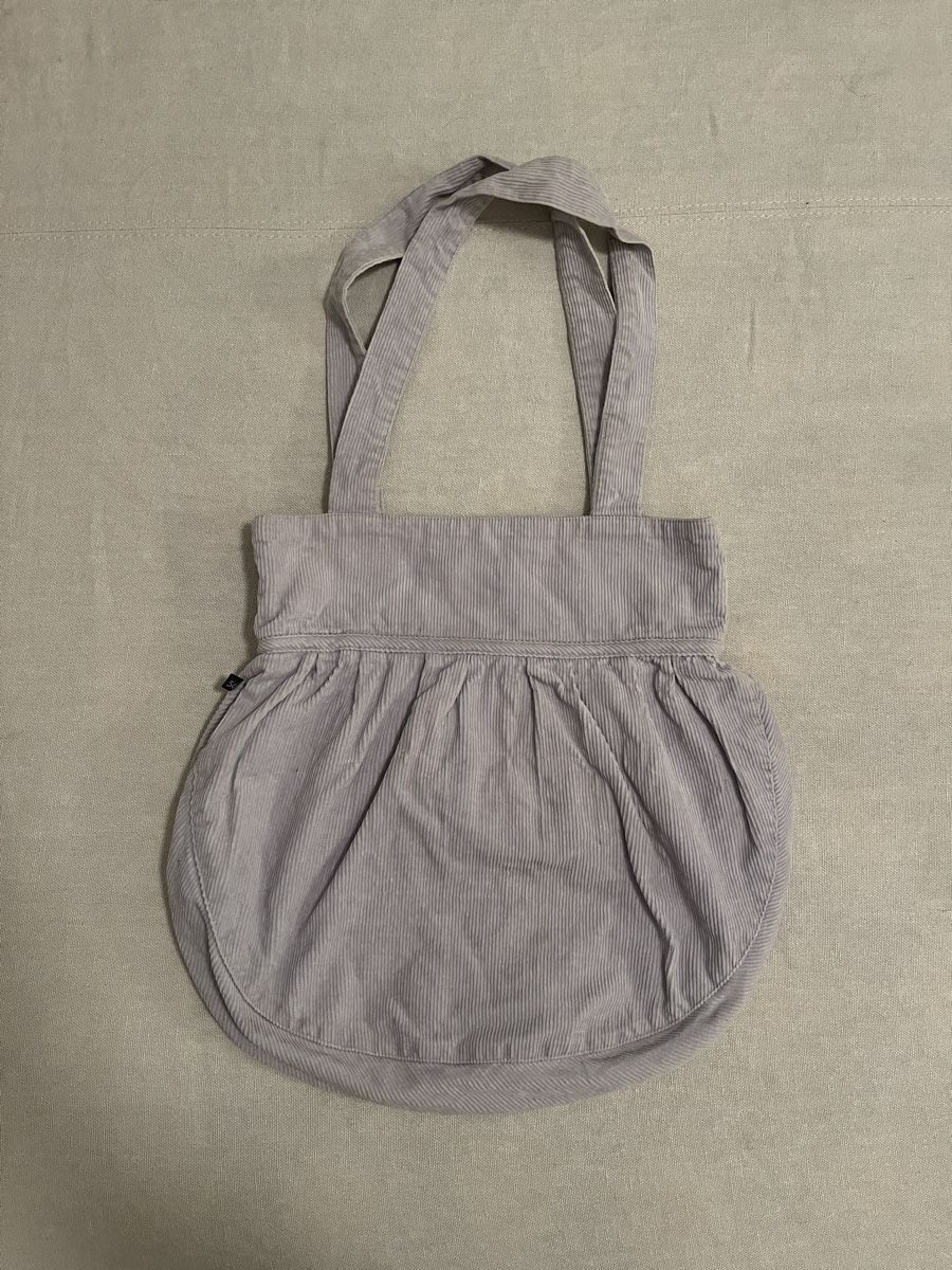 Borse da donna: Borsa Subdued con fiocco a coste lilla chiaro. – Usato da Mendrisio venduto da cost.del 3