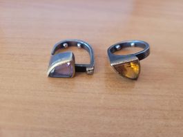 Schickes kunstvolles Ringpaar mit Brilliant, Topas, Amethyst