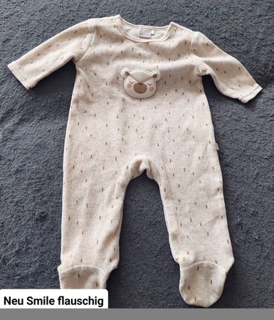Baby Strampler Smile beige flauschig Grösse 62 neu