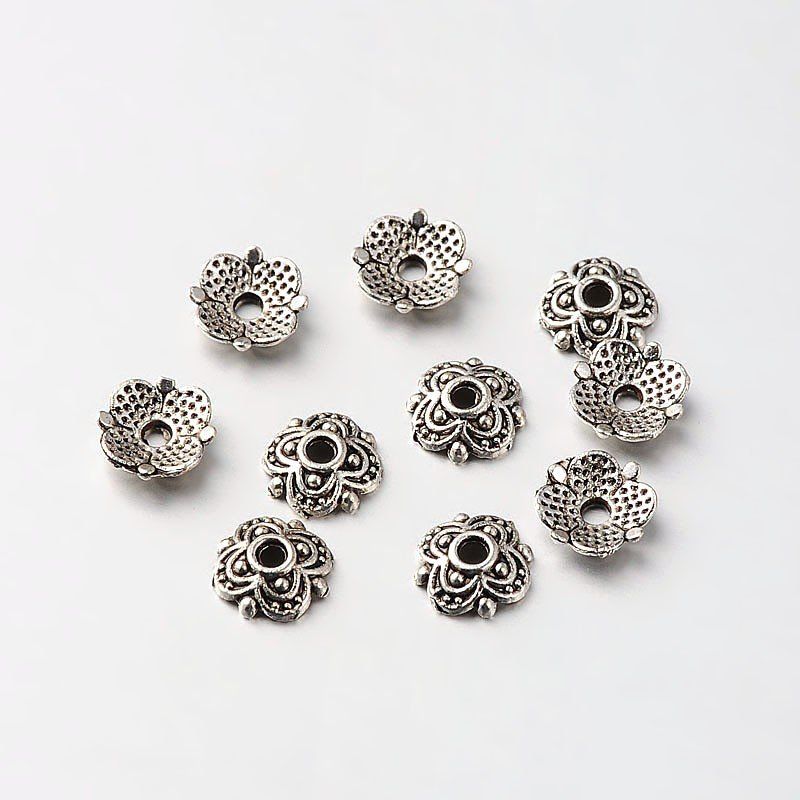 Perle (finte): Perlenkappe Blume Antik Silber 8x2mm / 100Stück – Nuovo (secondo la descrizione) da Rüegsau venduto da Tausendfreund