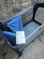 Praktisches Reisebett mit passender Matratze  65x127
