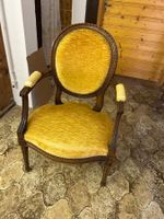 Fauteuil ancien avec accoudoir