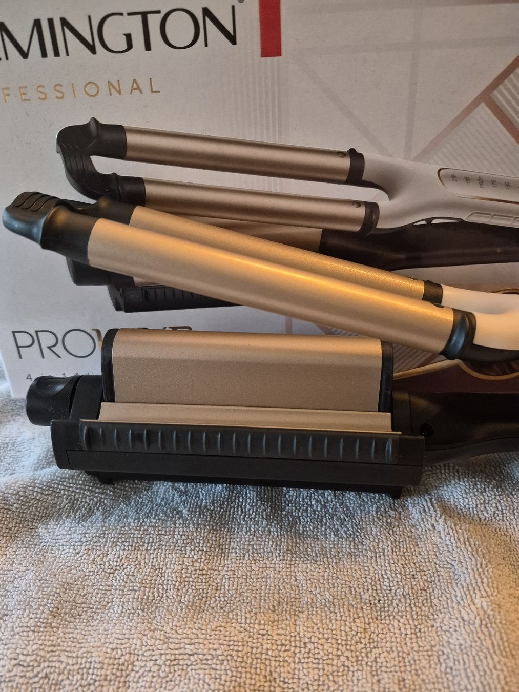 Remington Piastre & Arricciacapelli: Remington ProLuxe 4 in 1Adjustable Waver – Nuovo (secondo la descrizione) da Rikon im Tösstal venduto da Memski 1