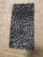 Tapis shaggy noir et blanc 50x100cm bon état