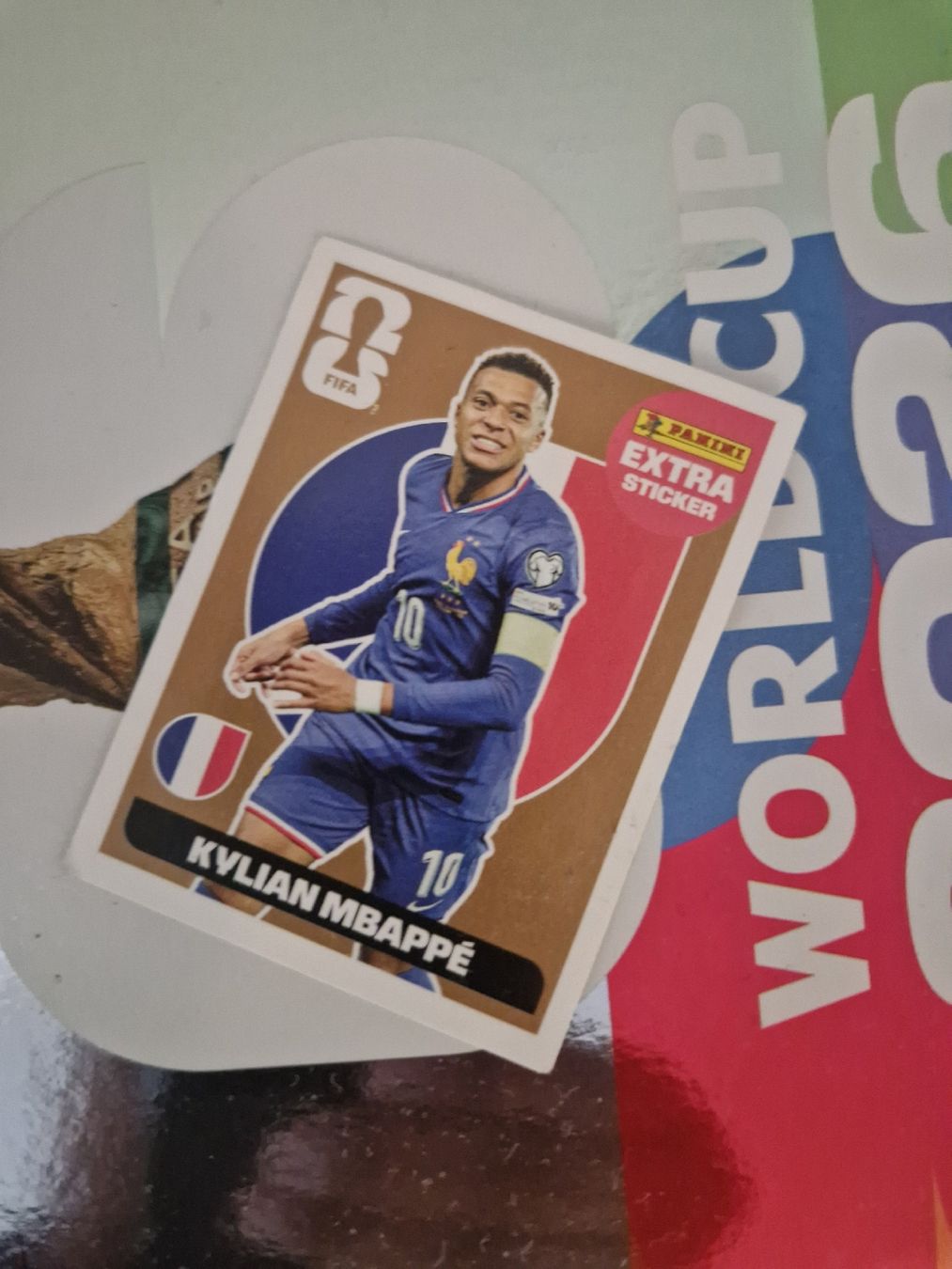 Panini Cartes à collectionner: Kylian Mbappé Bronze Extra Sticker Panini – Neuf avec emballage d'origine à Ecublens VD par Appuipro