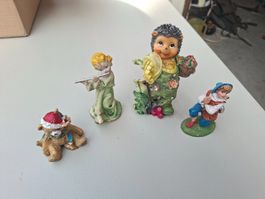 Vier Dekorationsfiguren Set Igel Bär Kind gebraucht