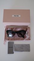 Miu Miu Cat-Eye Sunglasses