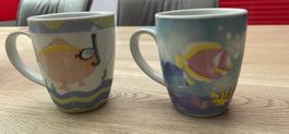 2 Tassen mit Fischmotiven von Domestic