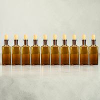 10 Bouteilles anciennes en verre brun avec bouchon en liège