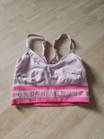 Under Armour Sport BH pink lila Grösse S/M