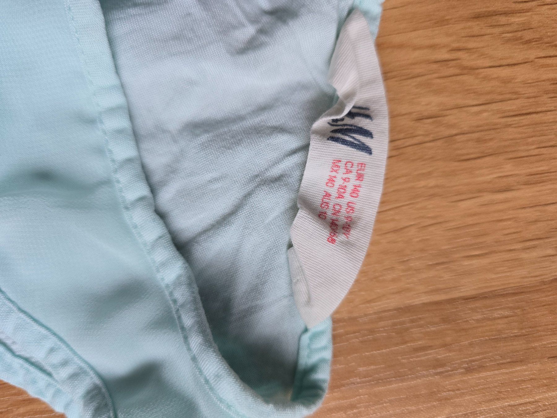 Camicette, T-shirt & Top: H&M Oberteil hellblau mit Rüschen Grösse 140 – Usato da Büttikon AG venduto da Amineah 1