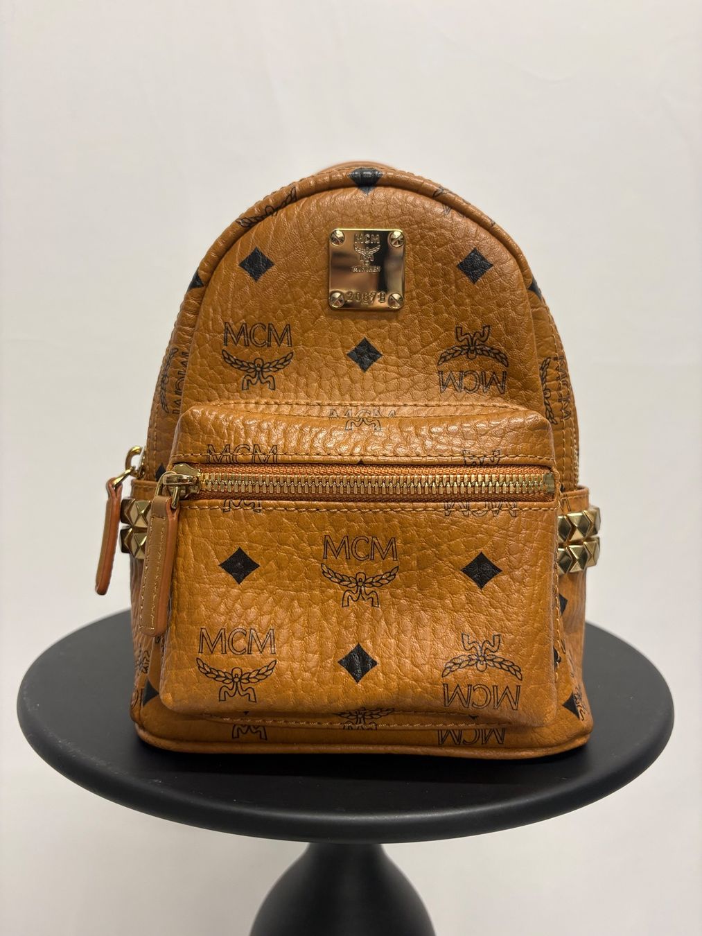 Mcm Borse da donna: MCM X-Mini Stark Bebe Boo Side Studs Rucksack in Cognac – Nuovo (secondo la descrizione) da Regensdorf venduto da secondchancefashion