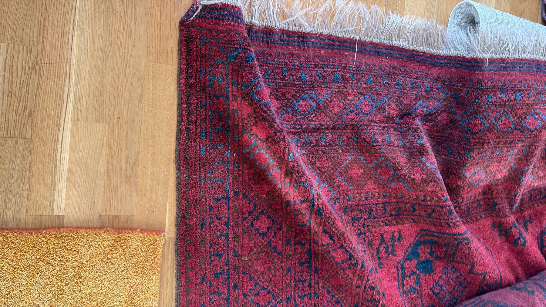 Tappeti: Orientteppich mit Fransen rot gemustert gebraucht – Usato da Chur venduto da Weltanschau