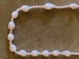Collier perles de différentes tailles
