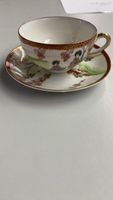 Japanische Porzellanteetasse mit Untertasse